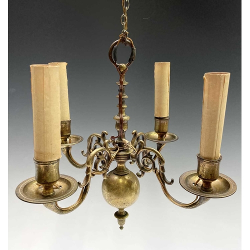 472 - A Dutch brass four branch chandelier, early 19th century, height 29cm, width 27cm.