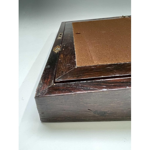 479 - A Victorian rosewood and brass inlaid writing box, with fitted interior, width 40.5cm.