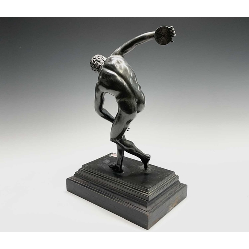 49 - After the Antique, a spelter figure of the discus thrower, 20th century, raised on a stepped ebonise... 