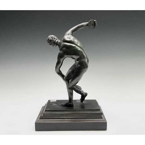 49 - After the Antique, a spelter figure of the discus thrower, 20th century, raised on a stepped ebonise... 