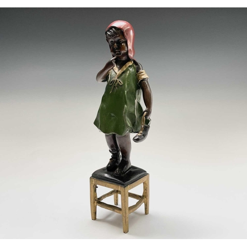 57 - After Juan Clena, a painted bronze sculpture of a girl standing on a stool. Height 37cm.