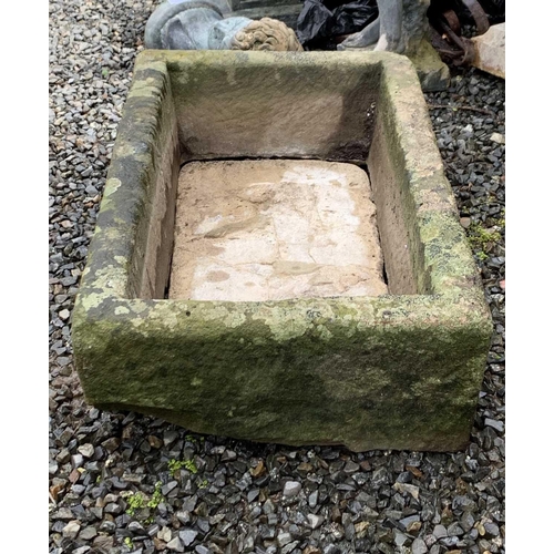 604 - A carved stone trough planter of rectangular form. Height 17cm, width 69cm, depth 40cm.