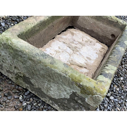 604 - A carved stone trough planter of rectangular form. Height 17cm, width 69cm, depth 40cm.