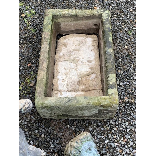 604 - A carved stone trough planter of rectangular form. Height 17cm, width 69cm, depth 40cm.