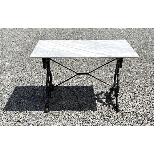 613 - A black painted cast iron garden table with rectangular marble top. Height 69.5cm, width 109cm, dept... 