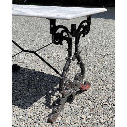 613 - A black painted cast iron garden table with rectangular marble top. Height 69.5cm, width 109cm, dept... 