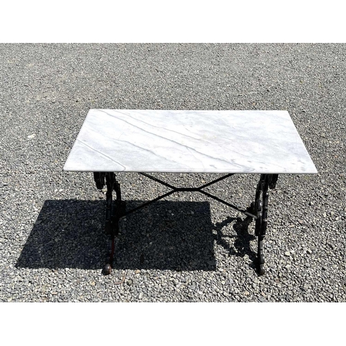 613 - A black painted cast iron garden table with rectangular marble top. Height 69.5cm, width 109cm, dept... 