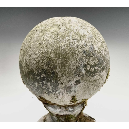 617 - A composition stone gate post ball finial. Height 35cm.