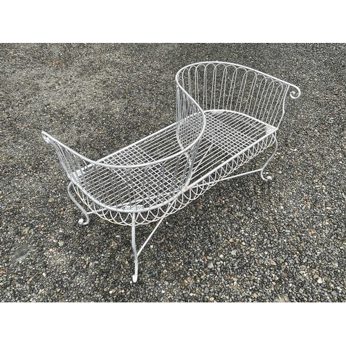 629 - A wrought iron garden love seat, width 116cm.