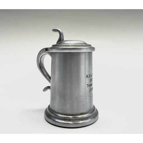 63 - A Dunhill lighter in the form of a pewter flagon, height 9cm, together with a cut glass scent bottle... 