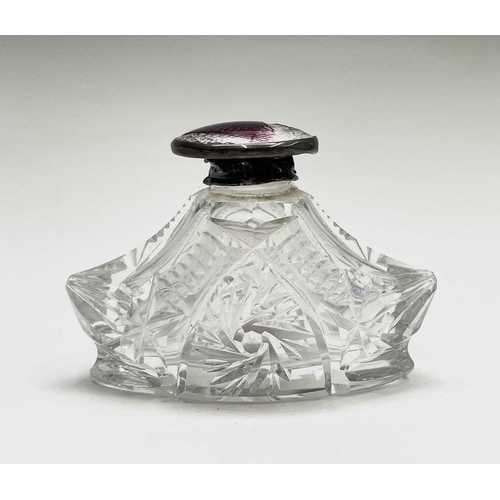 63 - A Dunhill lighter in the form of a pewter flagon, height 9cm, together with a cut glass scent bottle... 