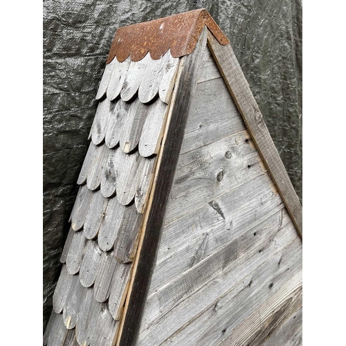 630 - A large birdhouse, with shingled roof and multiple white painted sections, height 133cm.