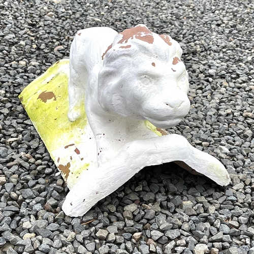 631 - A white painted terracotta roof tile, mounted with a figure of a lion, length 46cm.