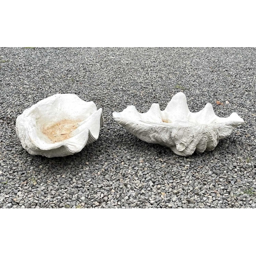 632 - A pair of reconstituted stone garden ornaments of giant clam shell form, width 62cm.