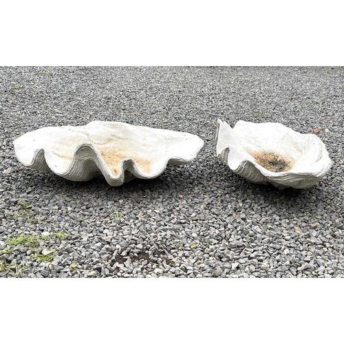 632 - A pair of reconstituted stone garden ornaments of giant clam shell form, width 62cm.