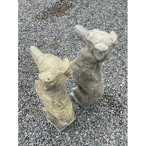 634 - A pair of Churchstone (limestone, sandstone and granite) garden figures of greyhounds, modern, heigh... 