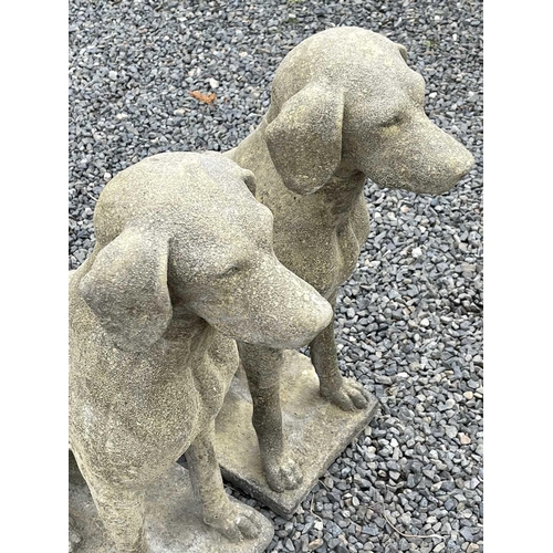 635 - A pair of Churchstone (limestone, sandstone and granite) garden figures of pointers, modern, height ... 