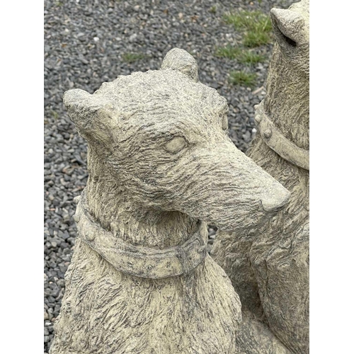 636 - A pair of Churchstone (limestone, sandstone and granite) garden figures of staghounds, modern, heigh... 