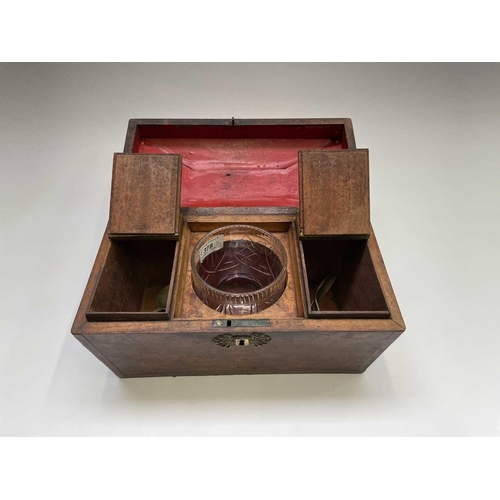 66 - A George III mahogany and chevron banded sarcophagus form tea caddy, internally fitted with a cut gl... 