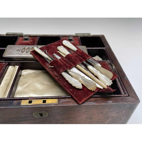 67 - A Victorian dressing case, the interior fitted with a lift out tray containing glass jars with plate... 