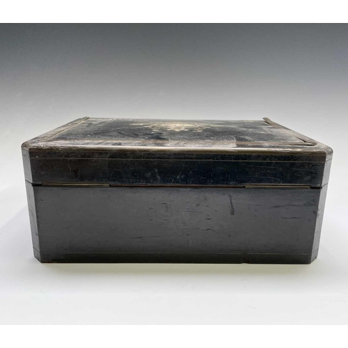 68 - A 19th century ebony and brass inlaid lady`s vanity box, the lid and front with a foliate scroll, br... 