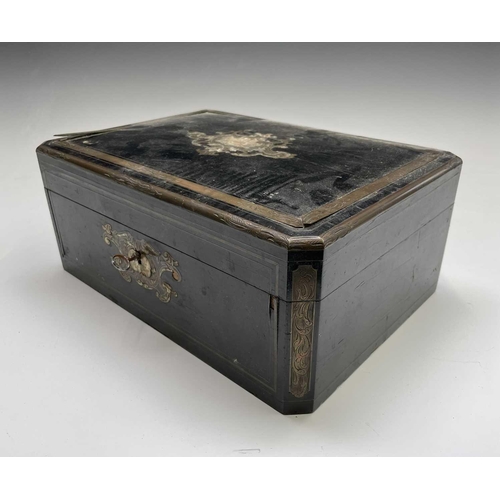 68 - A 19th century ebony and brass inlaid lady`s vanity box, the lid and front with a foliate scroll, br... 