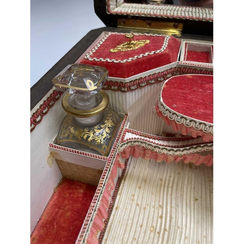 68 - A 19th century ebony and brass inlaid lady`s vanity box, the lid and front with a foliate scroll, br... 