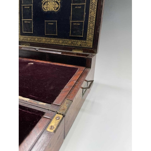 70 - An early Victorian rosewood and brass inlaid writing slope, the interior with tooled leather and vel... 