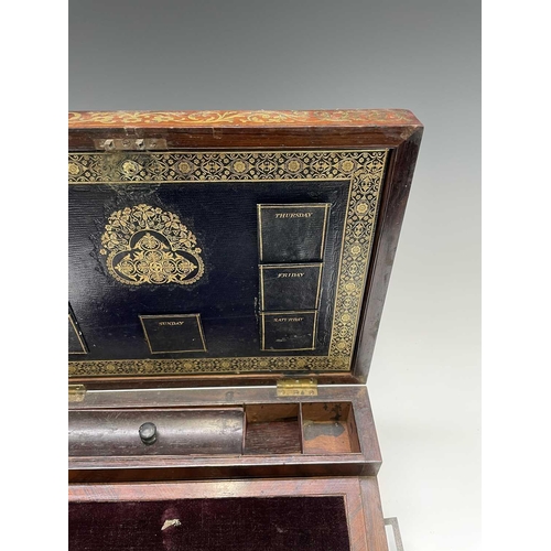 70 - An early Victorian rosewood and brass inlaid writing slope, the interior with tooled leather and vel... 