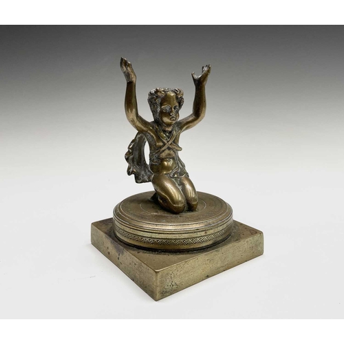 71 - A Regency gilt bronze figure of a cherubic youth, kneeling, formerly supporting a bowl or dish, heig... 