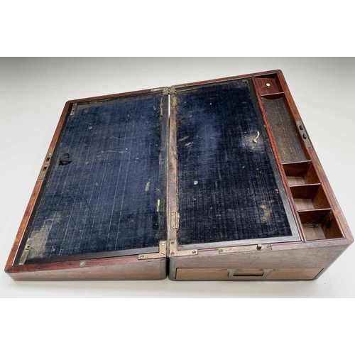 73 - A Victorian Colonial padouk and brass bound writing slope, with camphor wood lined interior and fitt... 