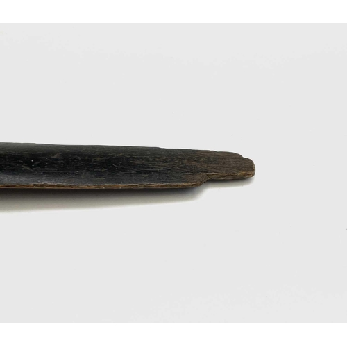 76 - A Victorian ebonised wood paper knife, the plated terminal cast with four grotesque faces. Length 34... 