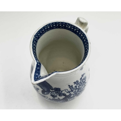 800 - A Worcester blue and white jug, circa 1780, printed in blue with the parrot pecking fruit pattern, w... 