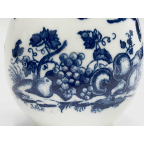 800 - A Worcester blue and white jug, circa 1780, printed in blue with the parrot pecking fruit pattern, w... 