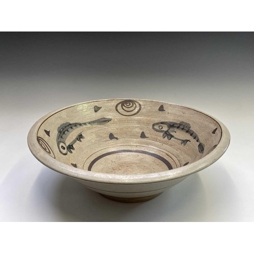 803 - A studio pottery stoneware bowl of large proportions internally painted with three fish. Height 18cm... 