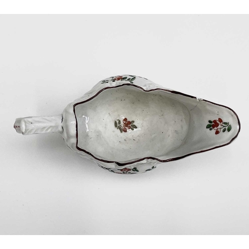 804 - A Plymouth porcelain rococo sauceboat, William Cookworthy, 1768-1770, with floral painted decoration... 