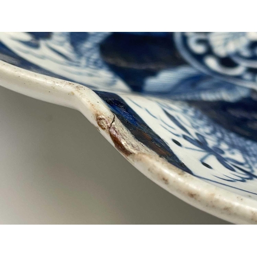 806 - A Worcester porcelain blue and white porcelain lobed oval dessert dish, circa 1770, painted with the... 