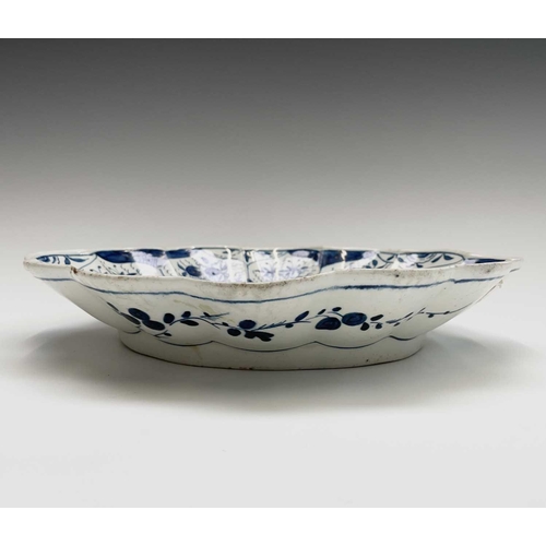 806 - A Worcester porcelain blue and white porcelain lobed oval dessert dish, circa 1770, painted with the... 