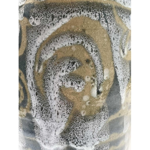 808 - Alan Brough, A slender studio pottery stoneware vase, with twin lug handles and with geometric motif... 