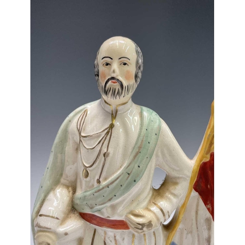 812 - A 19th century Staffordshire flatback portrait figure, 'Garibaldi', height 32cm, together with anoth... 