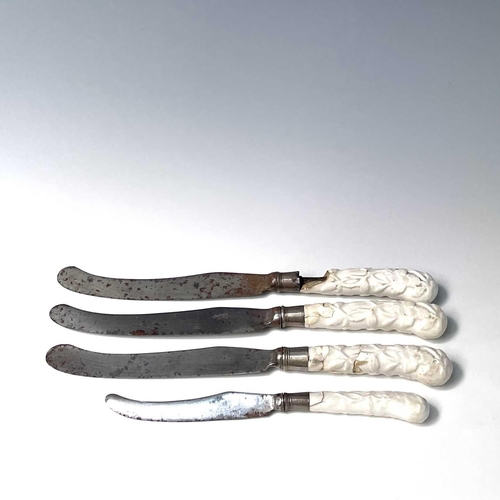 816 - Three Chelsea prunus moulded blanc de chine pistol grip knives, length 28cm, together with one other... 