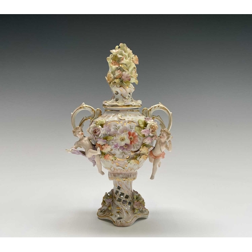 818 - An early 20th century Dresden porcelain twin handled pot pourri vase and cover, the central printed ... 