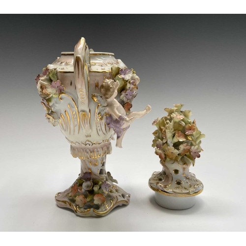 818 - An early 20th century Dresden porcelain twin handled pot pourri vase and cover, the central printed ... 