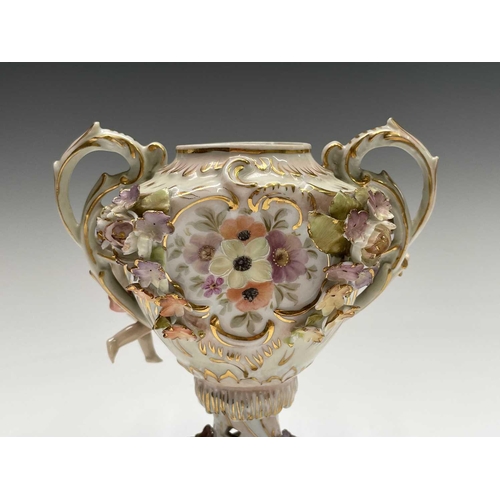 818 - An early 20th century Dresden porcelain twin handled pot pourri vase and cover, the central printed ... 