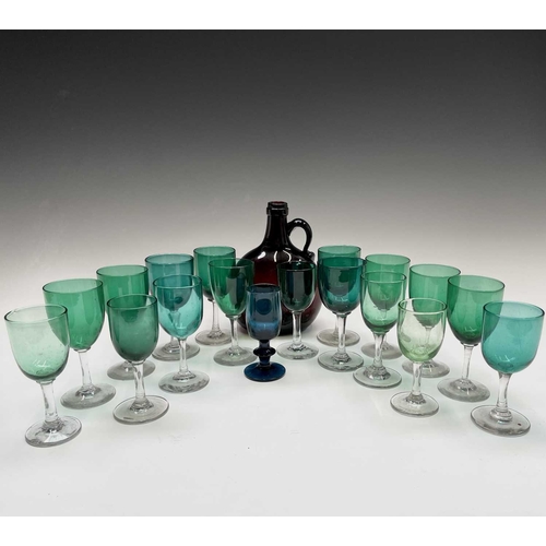 820 - An assortment of Victorian and later wine glasses with green and blue coloured bowls, together with ... 