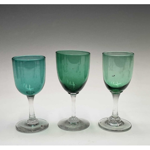 820 - An assortment of Victorian and later wine glasses with green and blue coloured bowls, together with ... 