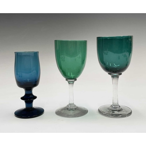 820 - An assortment of Victorian and later wine glasses with green and blue coloured bowls, together with ... 