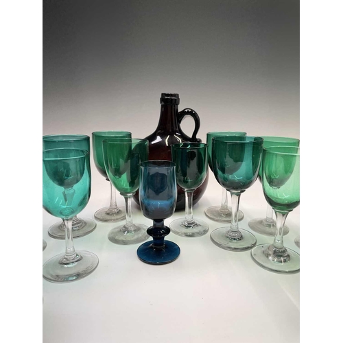 820 - An assortment of Victorian and later wine glasses with green and blue coloured bowls, together with ... 