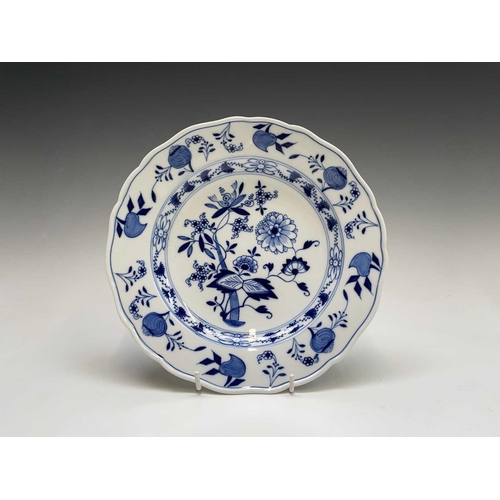 842 - A Meissen blue and white onion pattern plate, diameter 24.5cm, together with a Dresden Floral decora... 