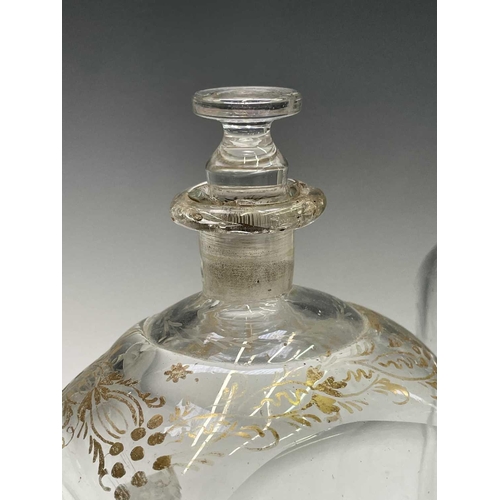 848 - An early 19th century square glass decanter with stopper, etched 'RUM', height 23cm, another decante... 